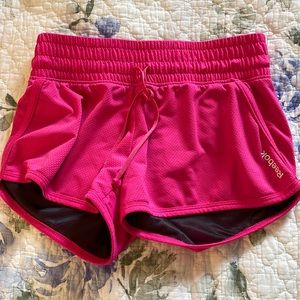 Hot Pink Reebok athletic shorts